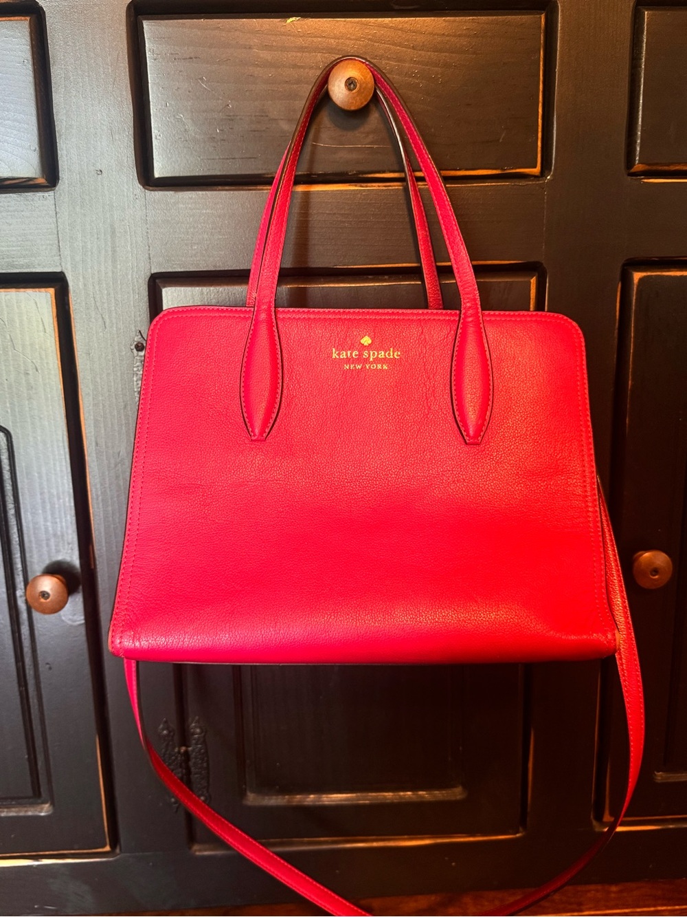 kate spade pink leather tote with gold logo and top handles